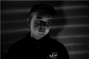 B&W Noir style image of student lurking